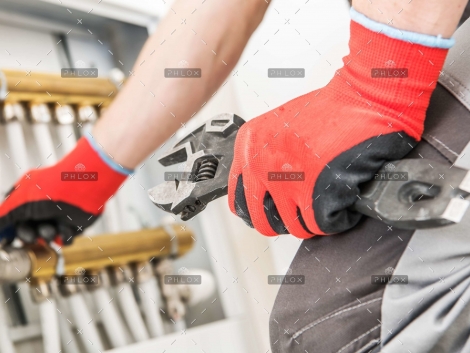 demo-attachment-137-op_technician-repairs-heating-JFGPBHA-scaled
